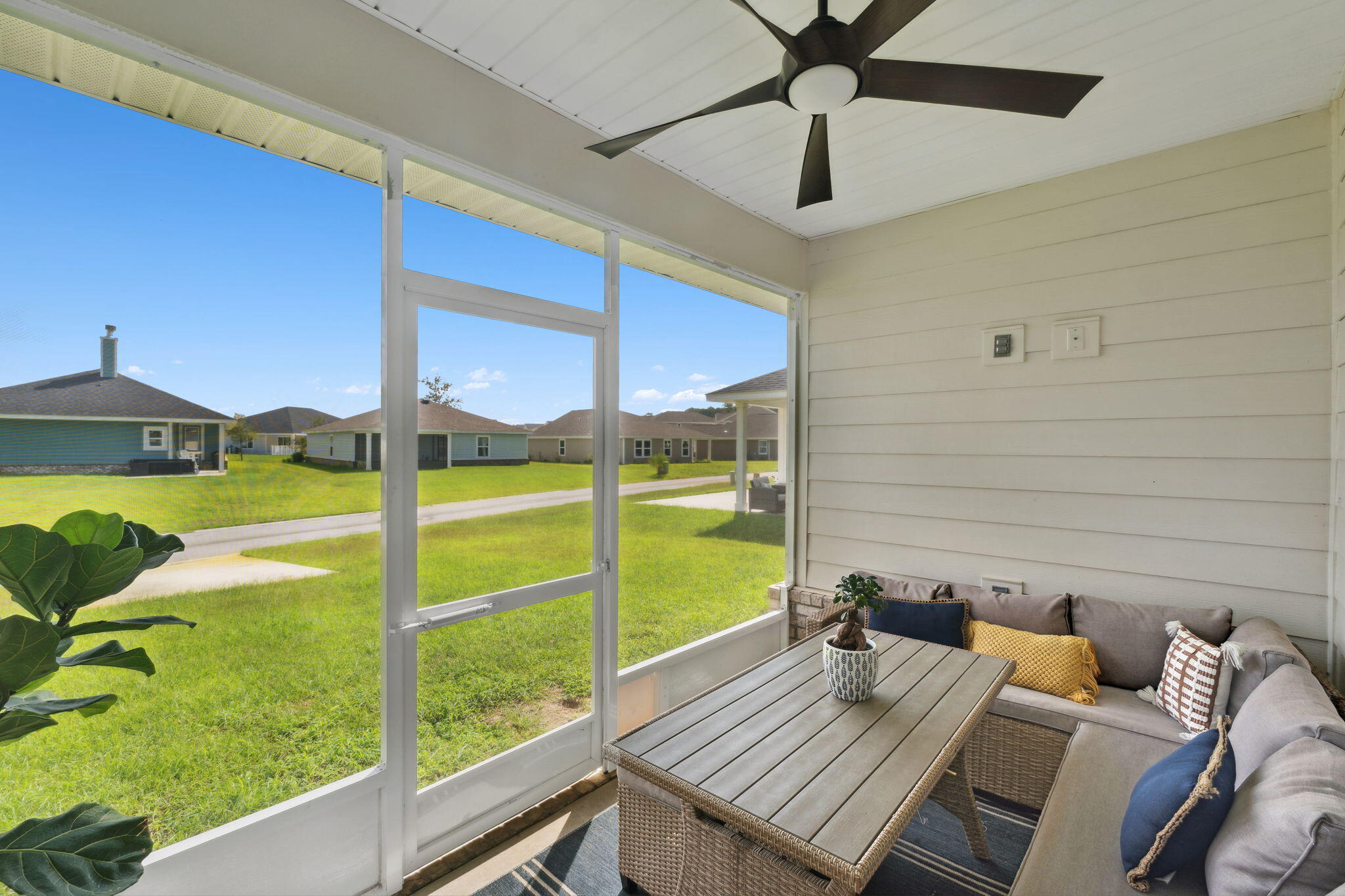585 Riverwalk Circle Freeport, FL 32439 - Photo 28 of 36 a view of sitting area with furniture and garden