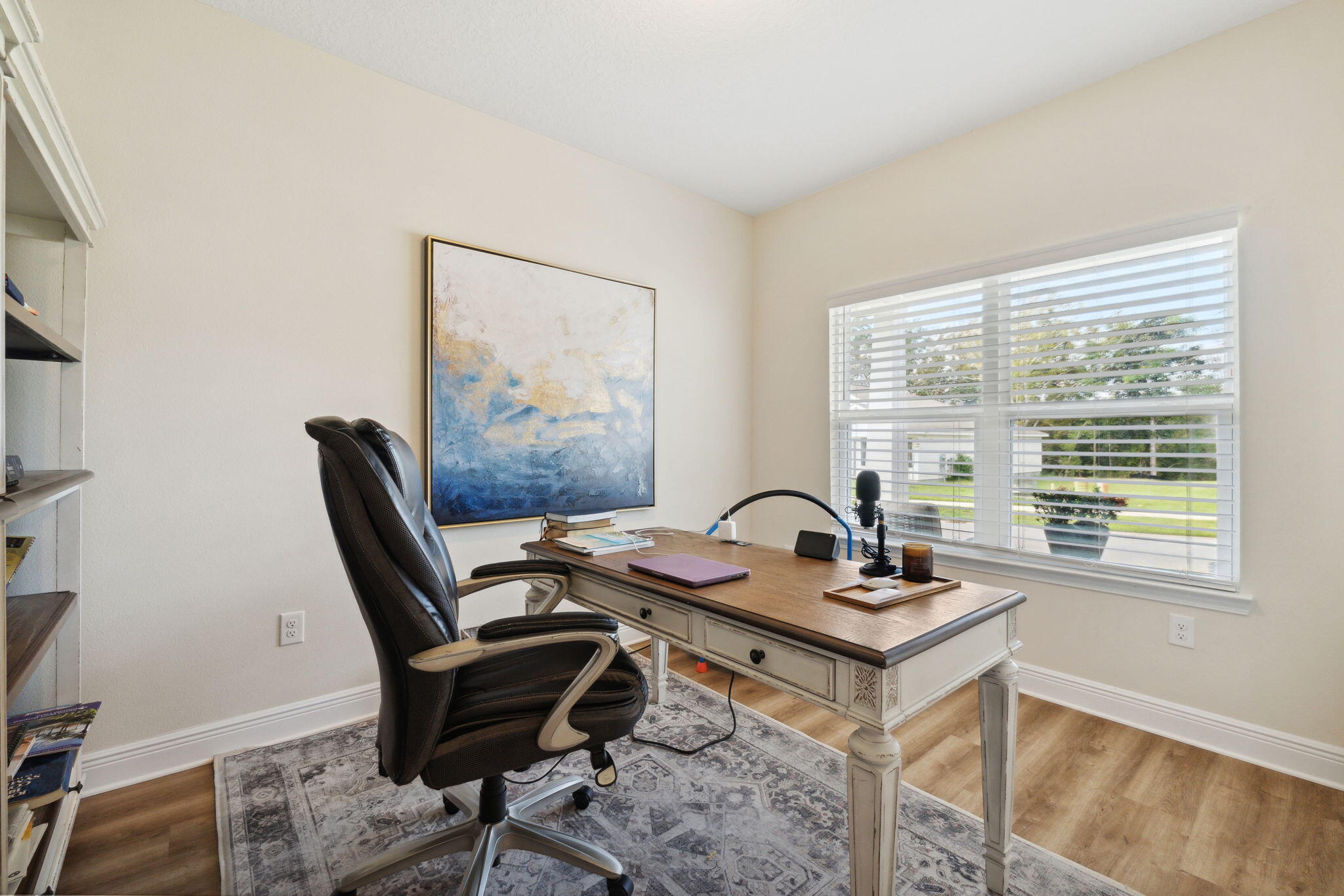 585 Riverwalk Circle Freeport, FL 32439 - Photo 6 of 36 a workspace with furniture and a window