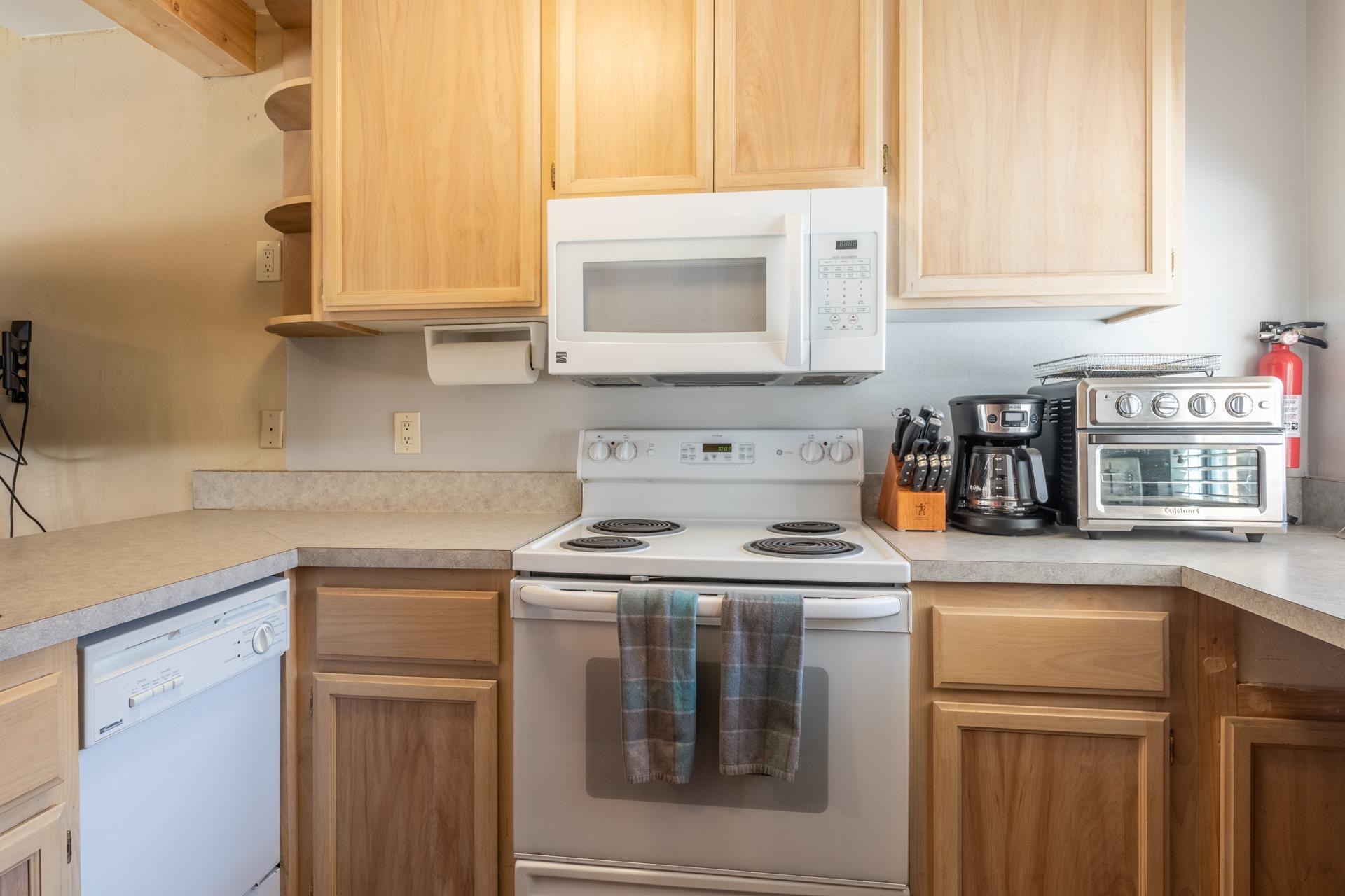 56 Davison Road, Unit 107 Mammoth Lakes, CA 93546 - Photo 8 of 28 a kitchen with stainless steel appliances granite countertop a sink and a stove