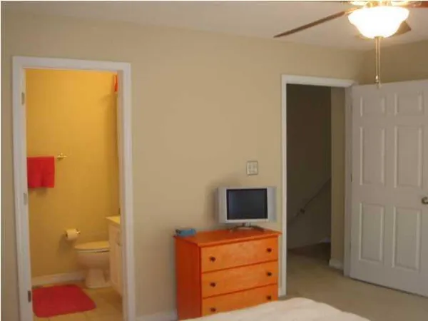 a view of a small space with wooden floor