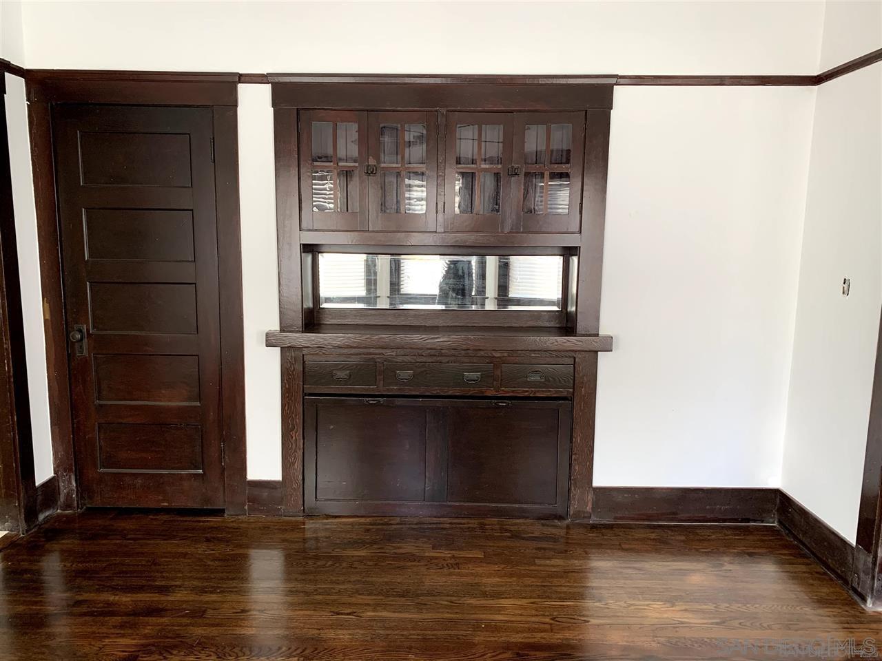 838 21st Street San Diego, CA 92102 - Photo 11 of 16 a living room with a fireplace