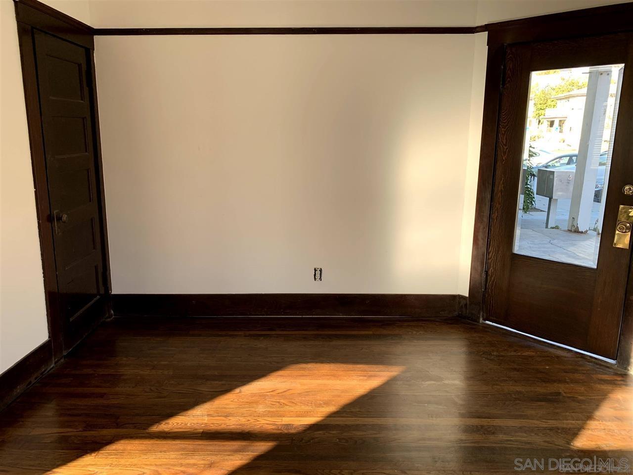 838 21st Street San Diego, CA 92102 - Photo 15 of 16 a view of a closet with wooden floor