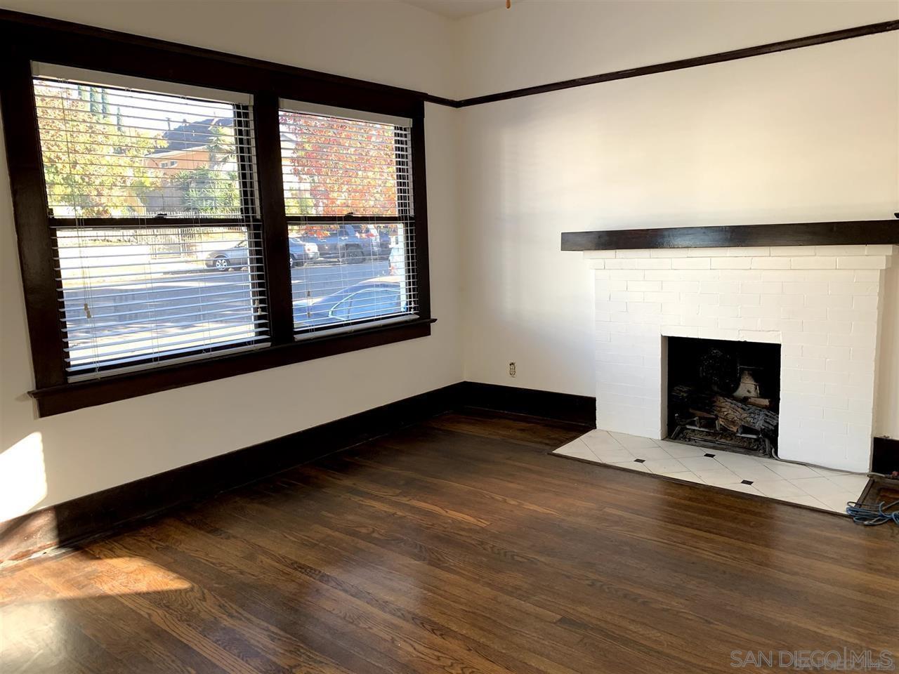 838 21st Street San Diego, CA 92102 - Photo 16 of 16 a view of an empty room with wooden floor and a window