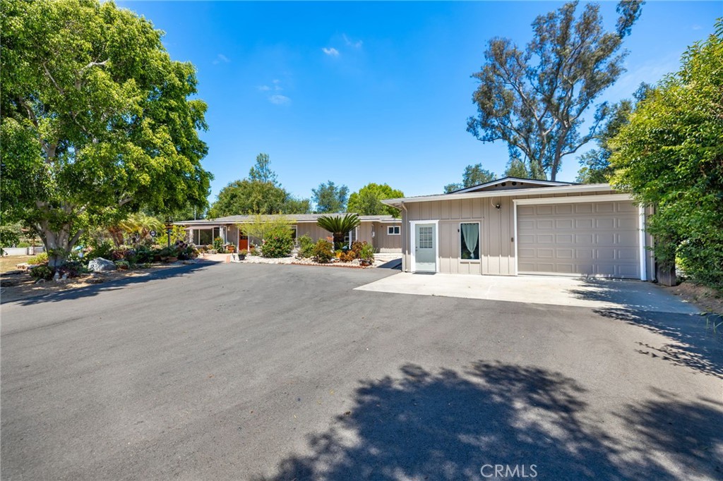 1256 East Fallbrook Street Fallbrook, CA 92028 - Photo 42 of 59 front view of a house with a street