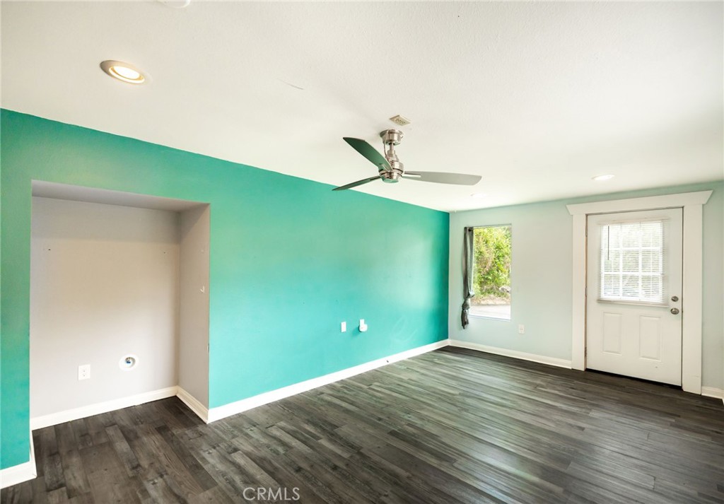 1256 East Fallbrook Street Fallbrook, CA 92028 - Photo 47 of 59 a view of empty room with wooden floor and fan