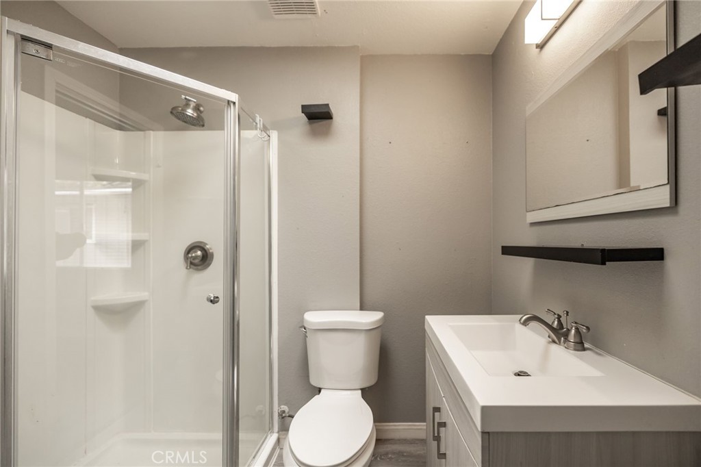 1256 East Fallbrook Street Fallbrook, CA 92028 - Photo 52 of 59 a bathroom with a sink toilet and shower