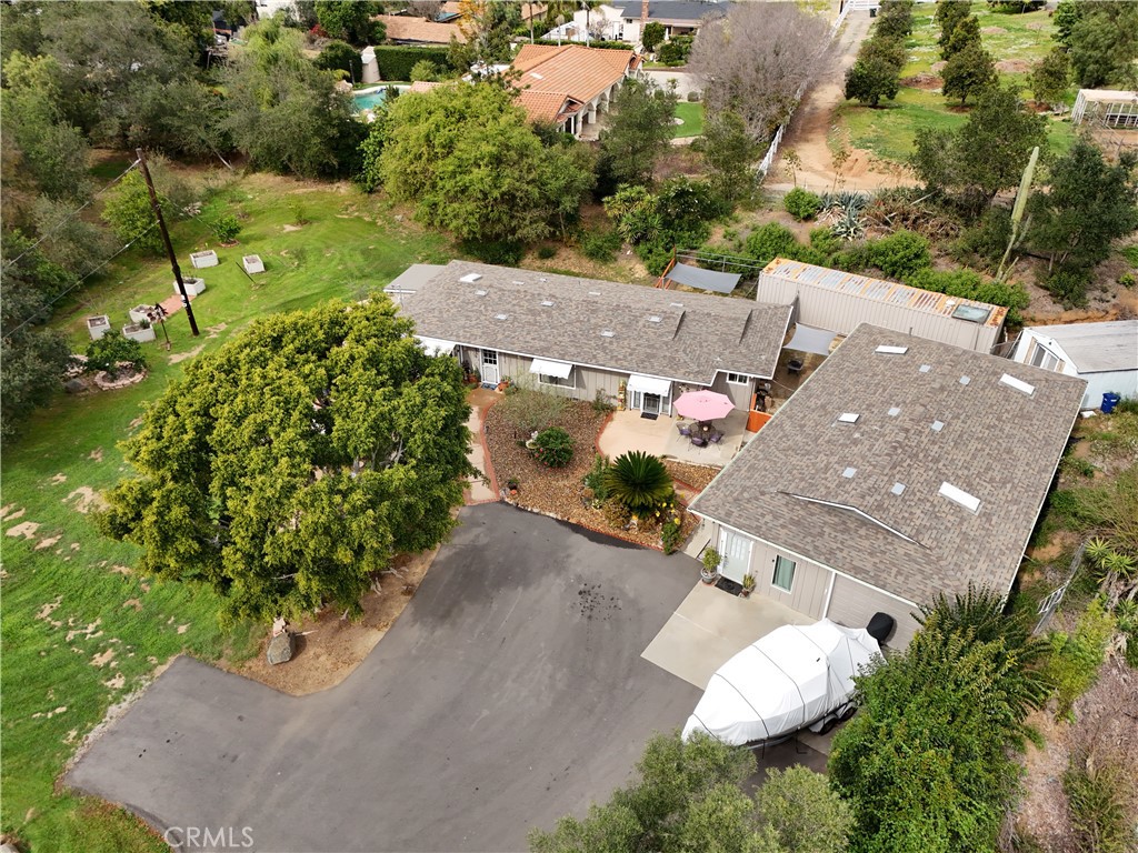 1256 East Fallbrook Street Fallbrook, CA 92028 - Photo 55 of 59 an aerial view of a house with a yard and lake view