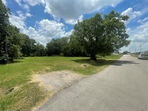 1127 West End Street Terrell, TX 75160 - Photo 6 of 11 a view of a field with trees in the background
