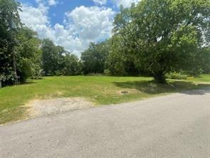 1127 West End Street Terrell, TX 75160 - Photo 8 of 11 a view of a field with a trees in the background