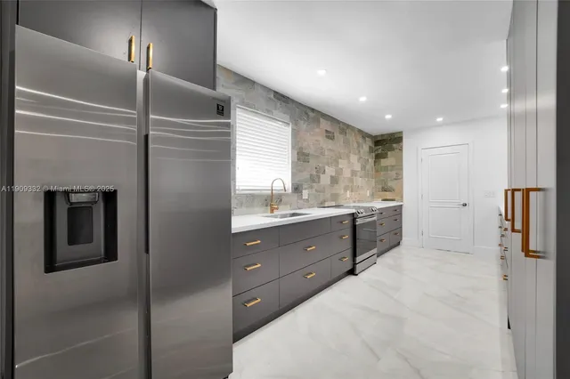 a bathroom with a double vanity sink and mirror