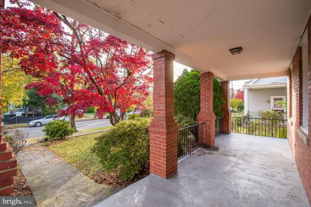 a view of a porch and garden