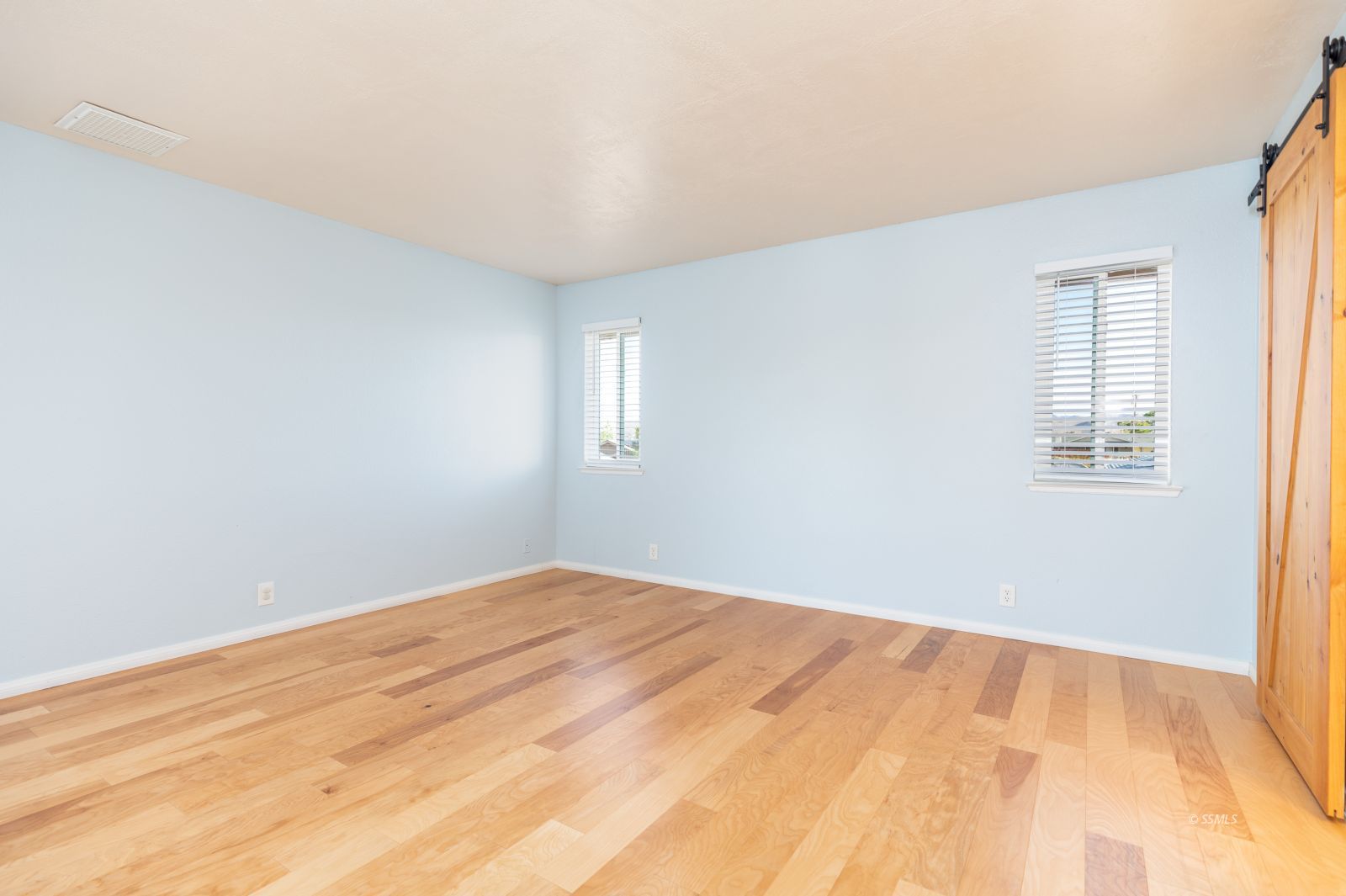 428 North Kern Street Ridgecrest, CA 93555 - Photo 15 of 30 a view of empty room with wooden floor