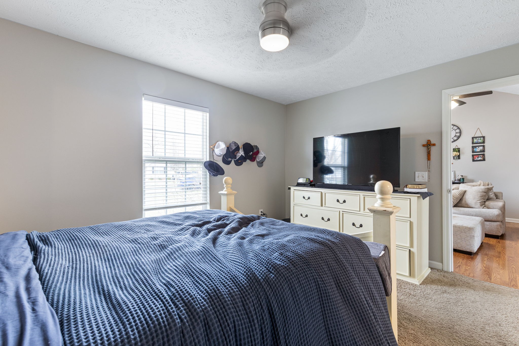 722 Eaglesham Drive Christiana, TN 37037 - Photo 14 of 29 a bedroom with a bed and a flat tv screen on wall