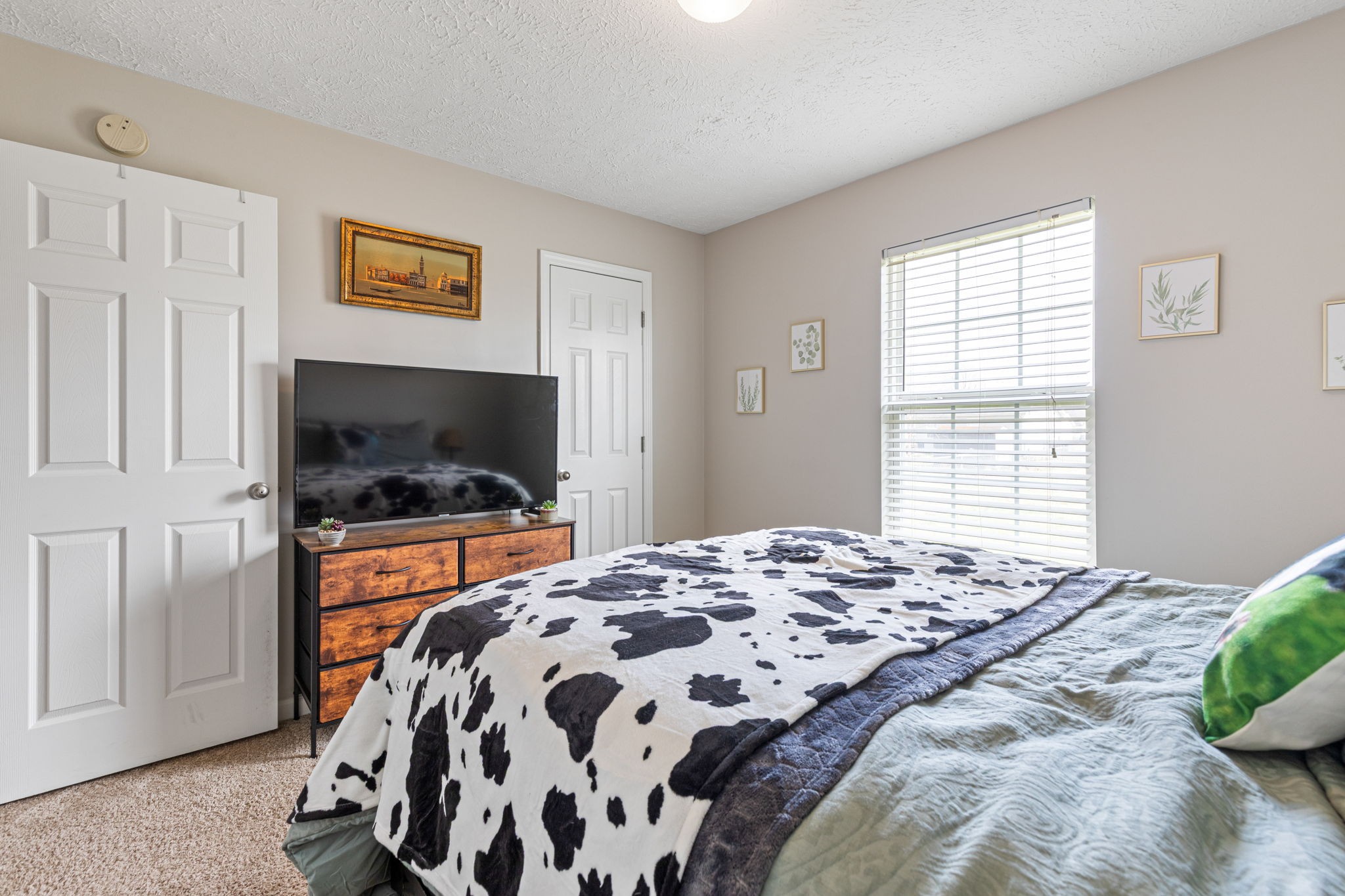 722 Eaglesham Drive Christiana, TN 37037 - Photo 21 of 29 a bedroom with a bed and a flat screen tv