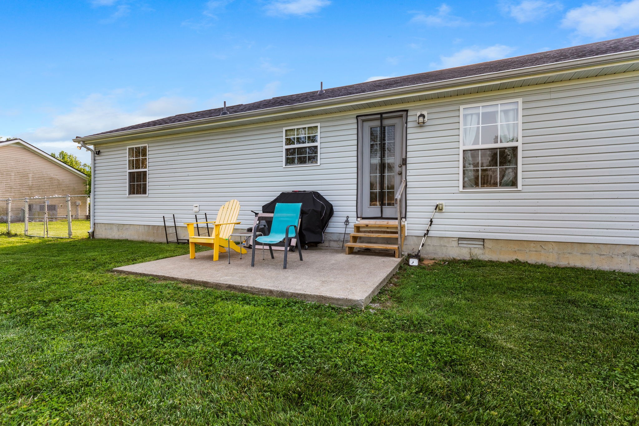 722 Eaglesham Drive Christiana, TN 37037 - Photo 23 of 29 a backyard of a house with table and chairs