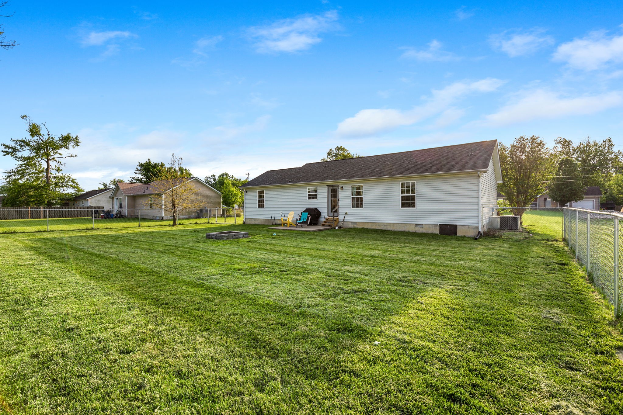 722 Eaglesham Drive Christiana, TN 37037 - Photo 25 of 29 a front view of house with yard and trees