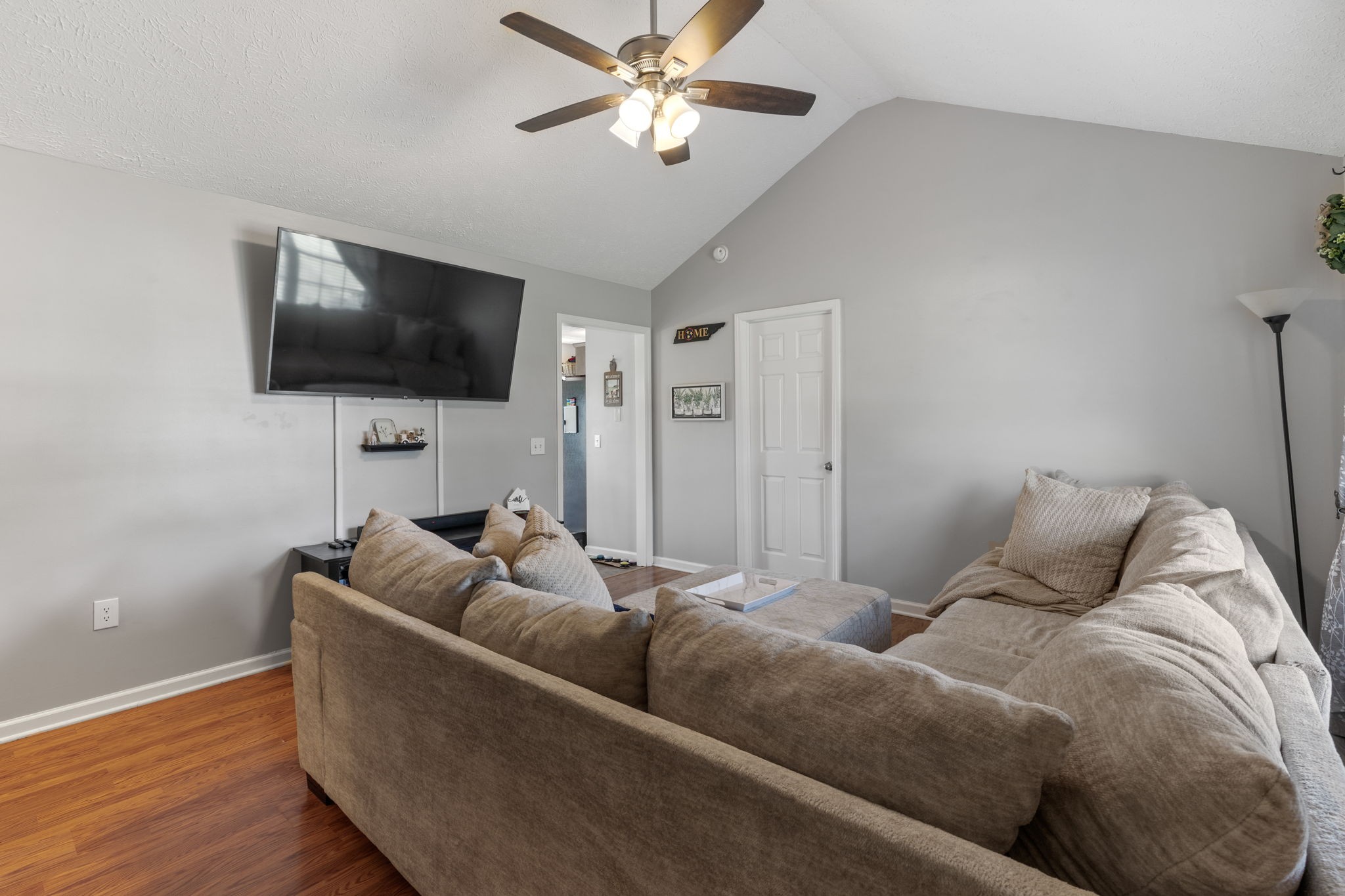 722 Eaglesham Drive Christiana, TN 37037 - Photo 3 of 29 a living room with furniture and a flat screen tv