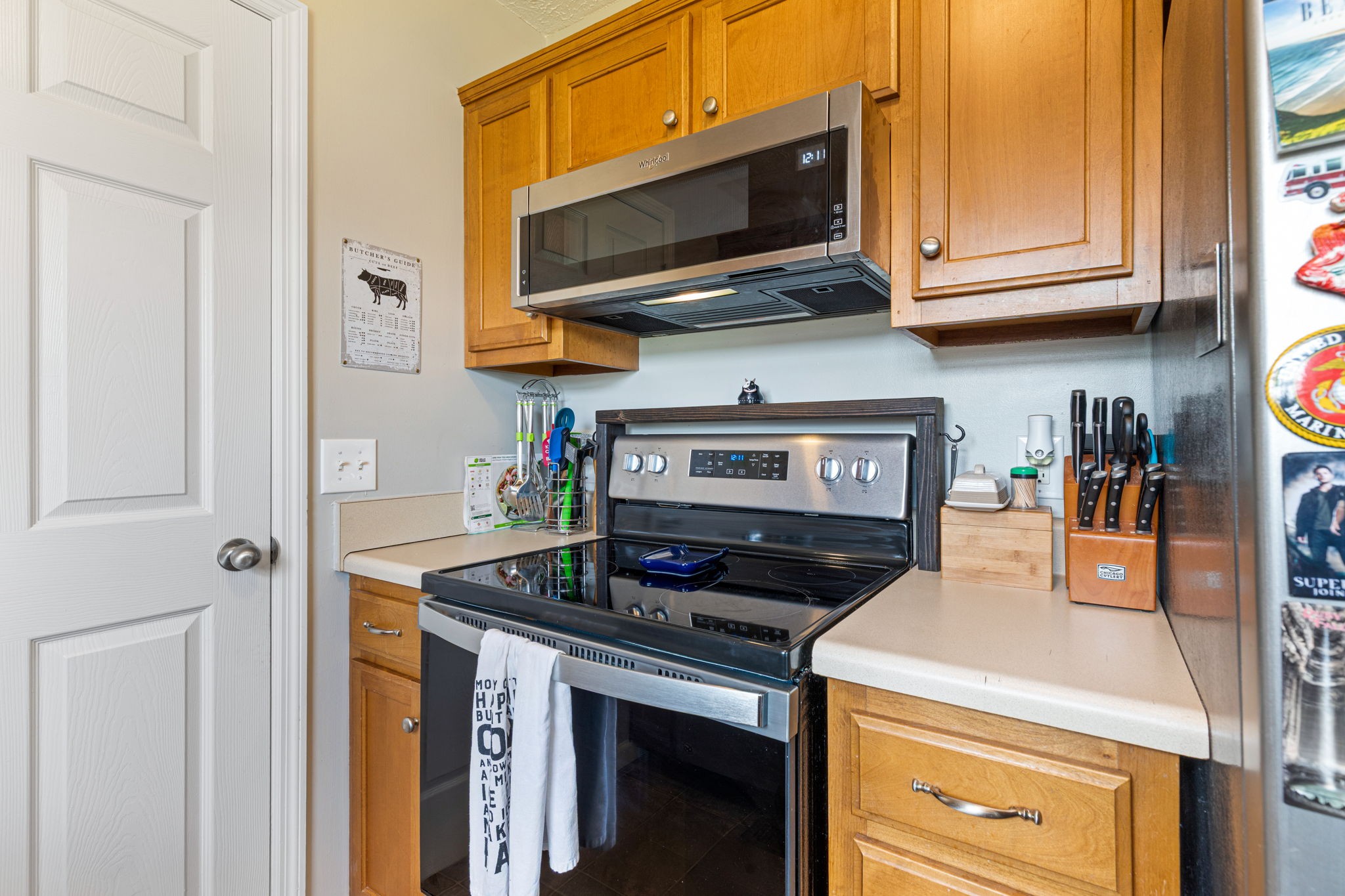 722 Eaglesham Drive Christiana, TN 37037 - Photo 8 of 29 a kitchen with stainless steel appliances granite countertop a stove and a microwave