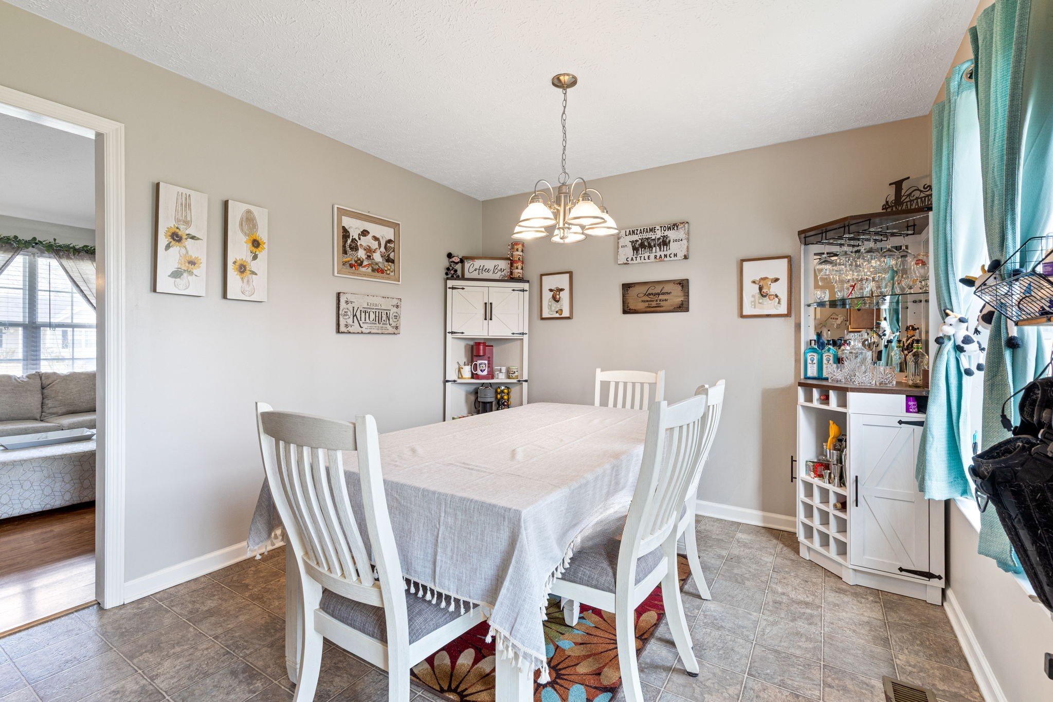 722 Eaglesham Drive Christiana, TN 37037 - Photo 10 of 29 a view of a dining room with furniture and chandelier