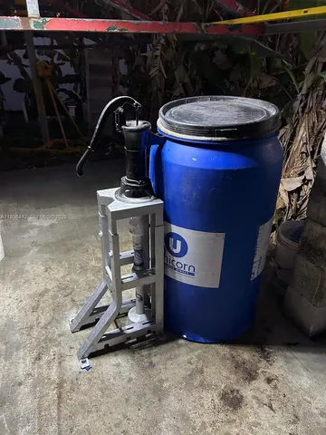 a view of a balcony next to a yard