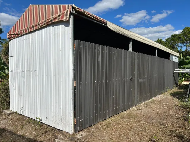 a view of a porch with furniture