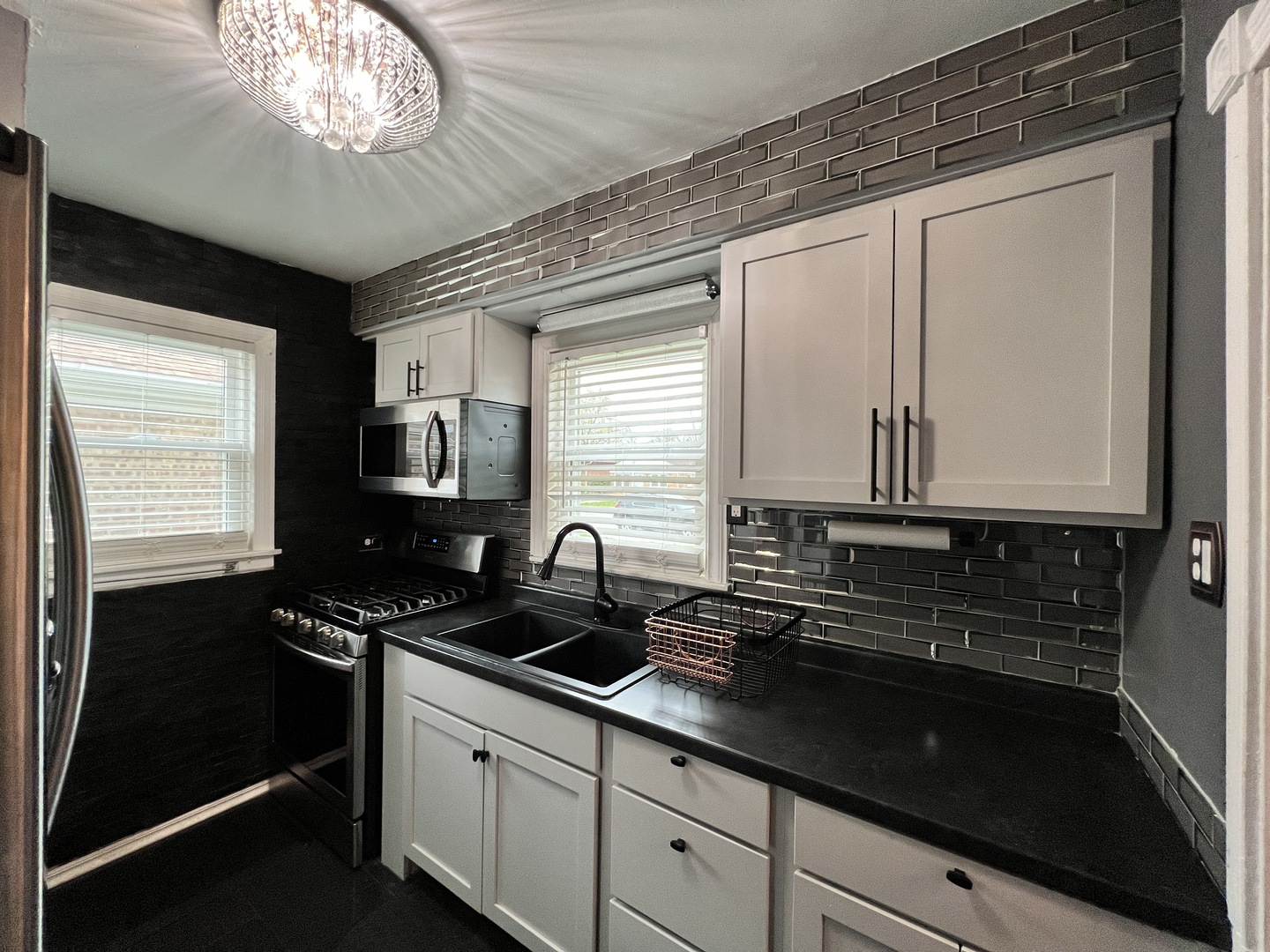 12240 South Racine Avenue Chicago, IL 60643 - Photo 4 of 14 a kitchen with a sink and cabinets