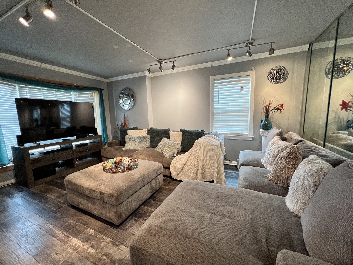 12240 South Racine Avenue Chicago, IL 60643 - Photo 5 of 14 a living room with furniture and a flat screen tv