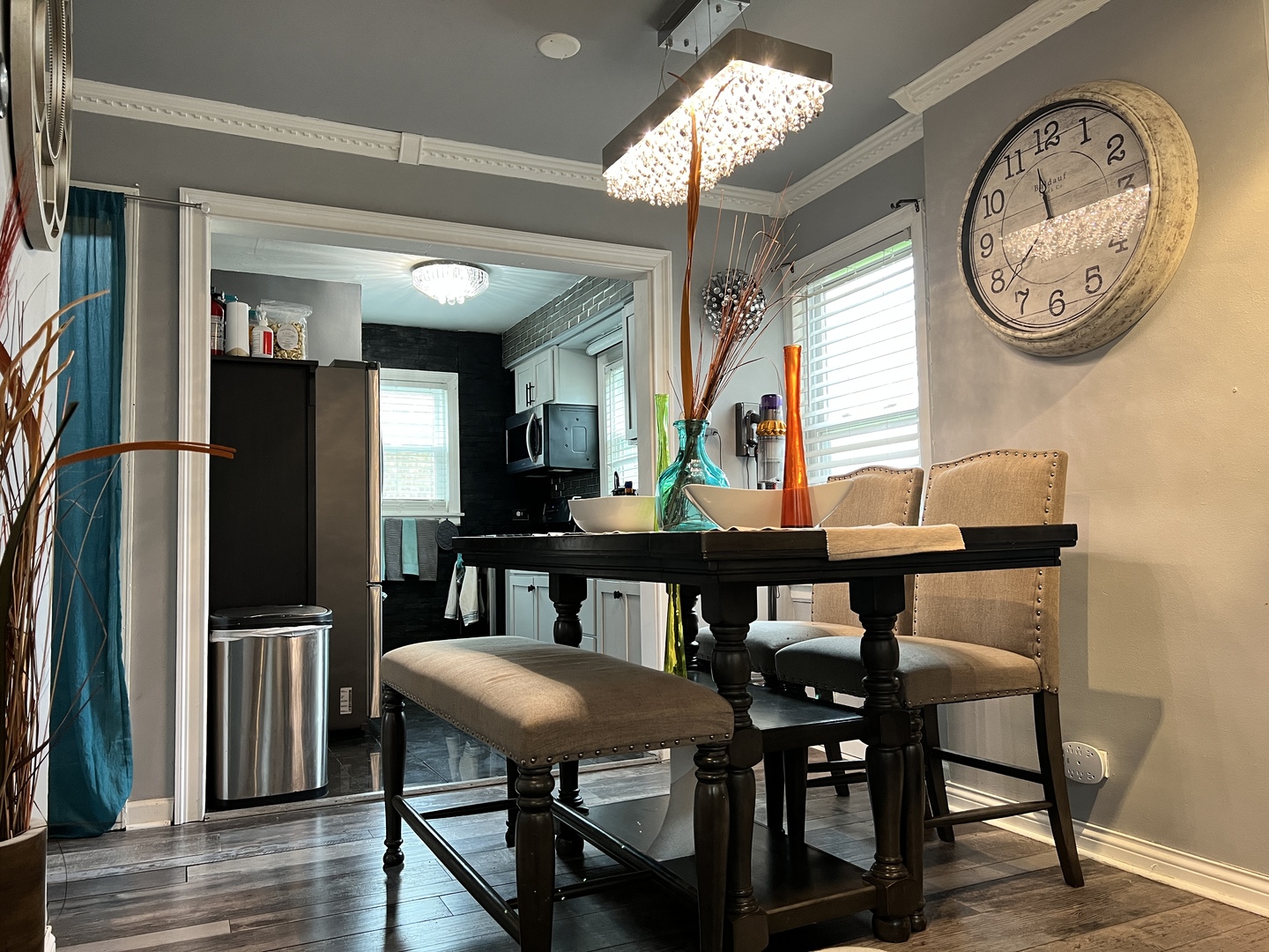 12240 South Racine Avenue Chicago, IL 60643 - Photo 6 of 14 a view of a dining room with furniture and a chandelier