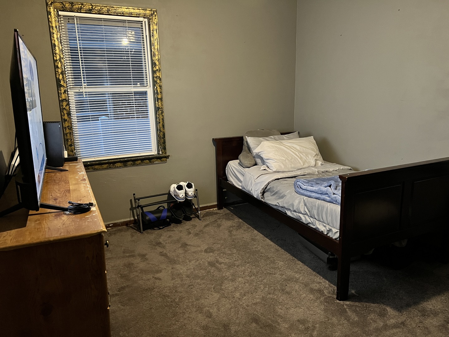 12240 South Racine Avenue Chicago, IL 60643 - Photo 9 of 14 a bedroom with a bed and a flat tv screen on dresser