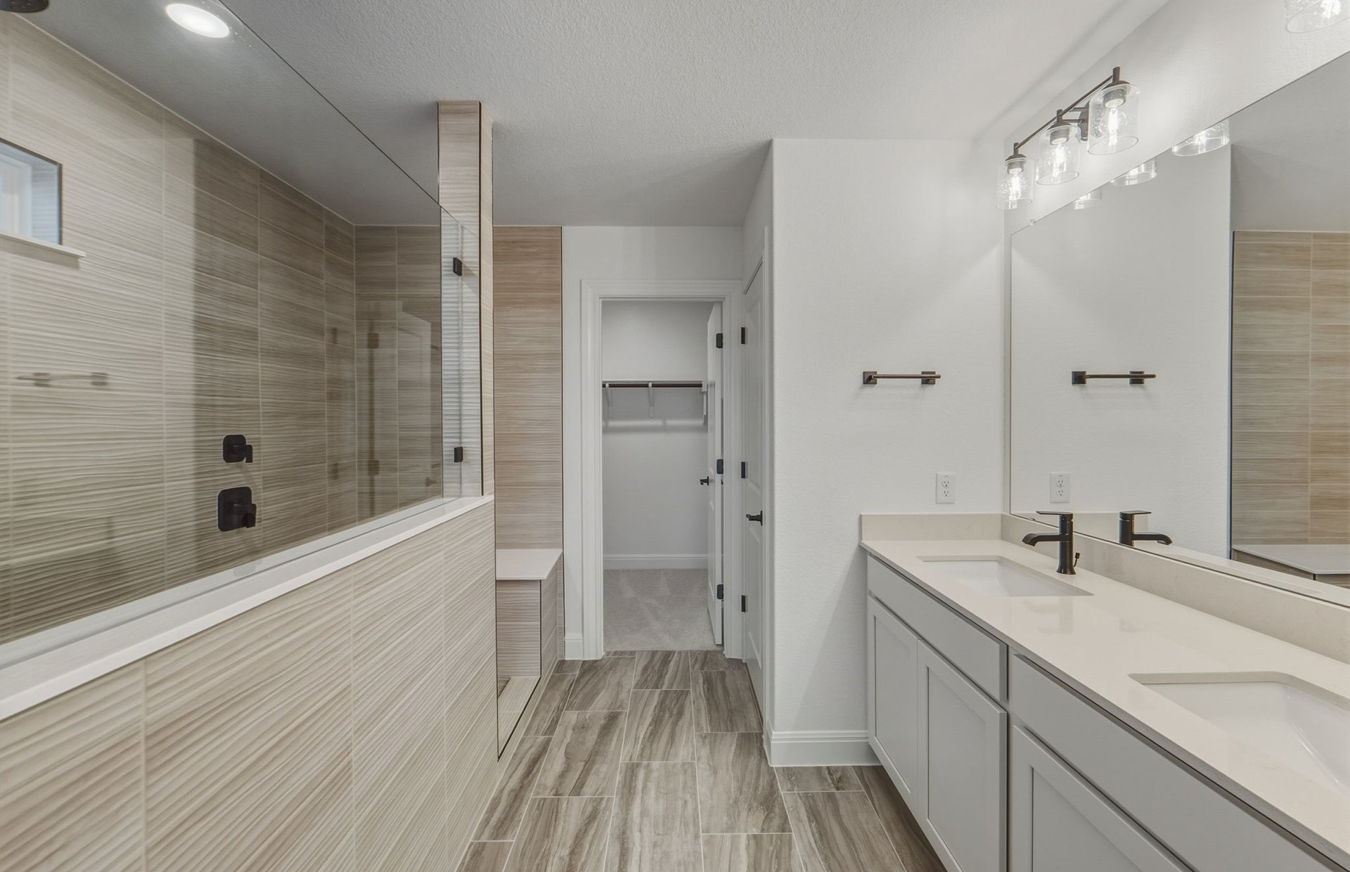 456 Foresail Road Leander, TX 78641 - Photo 10 of 22 a bathroom with a sink and a shower