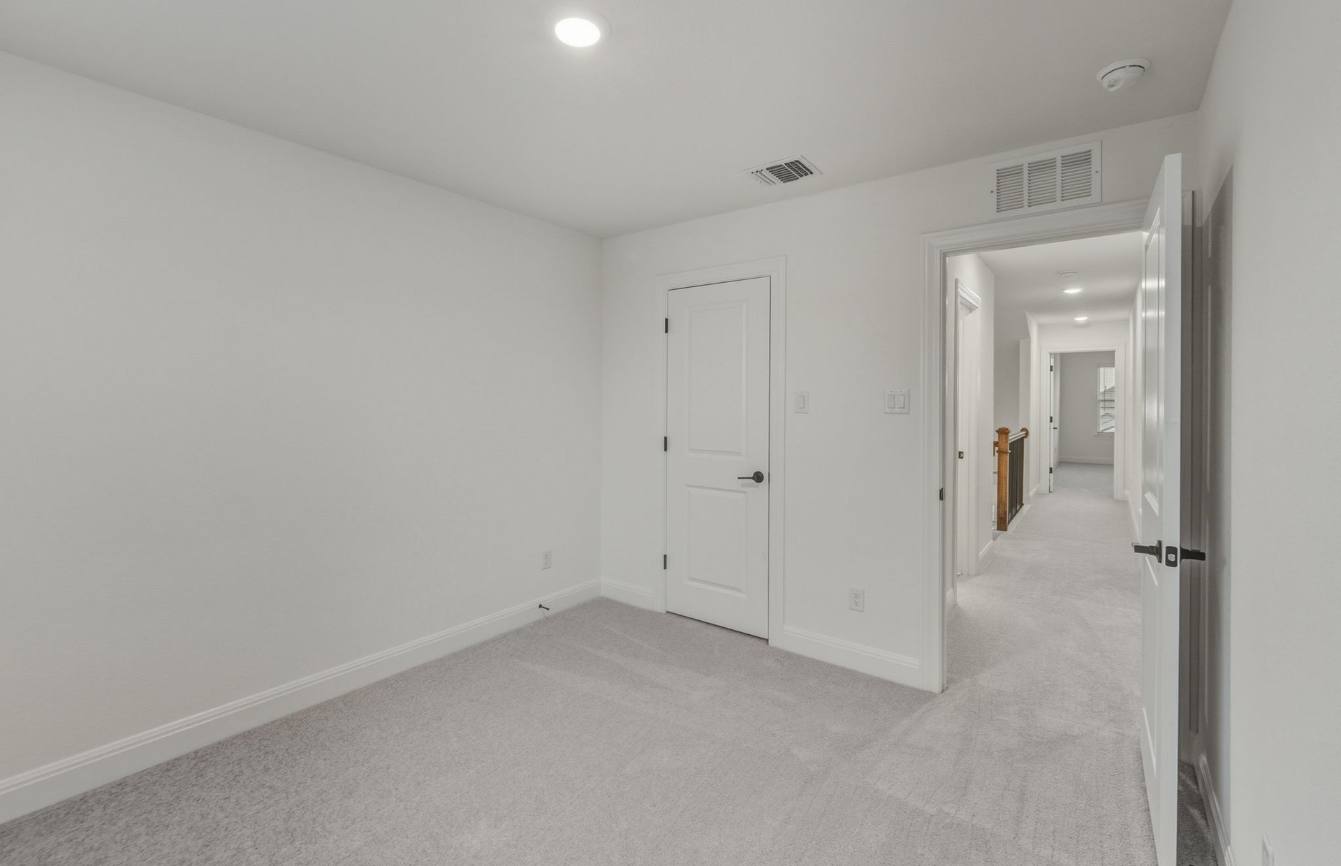 456 Foresail Road Leander, TX 78641 - Photo 14 of 22 wooden floor and cabinet in an empty room