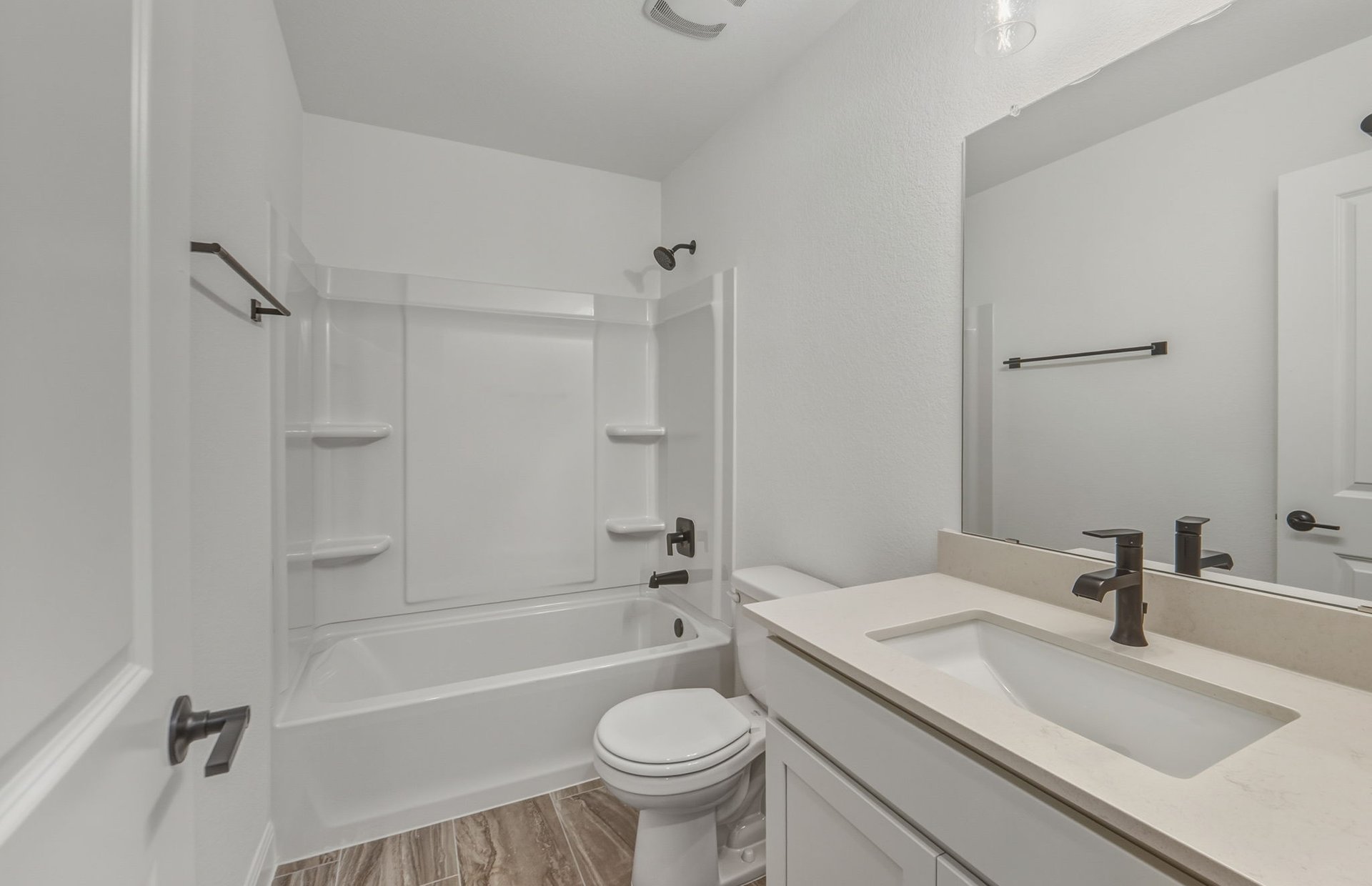 456 Foresail Road Leander, TX 78641 - Photo 16 of 22 a bathroom with a sink toilet tub and shower