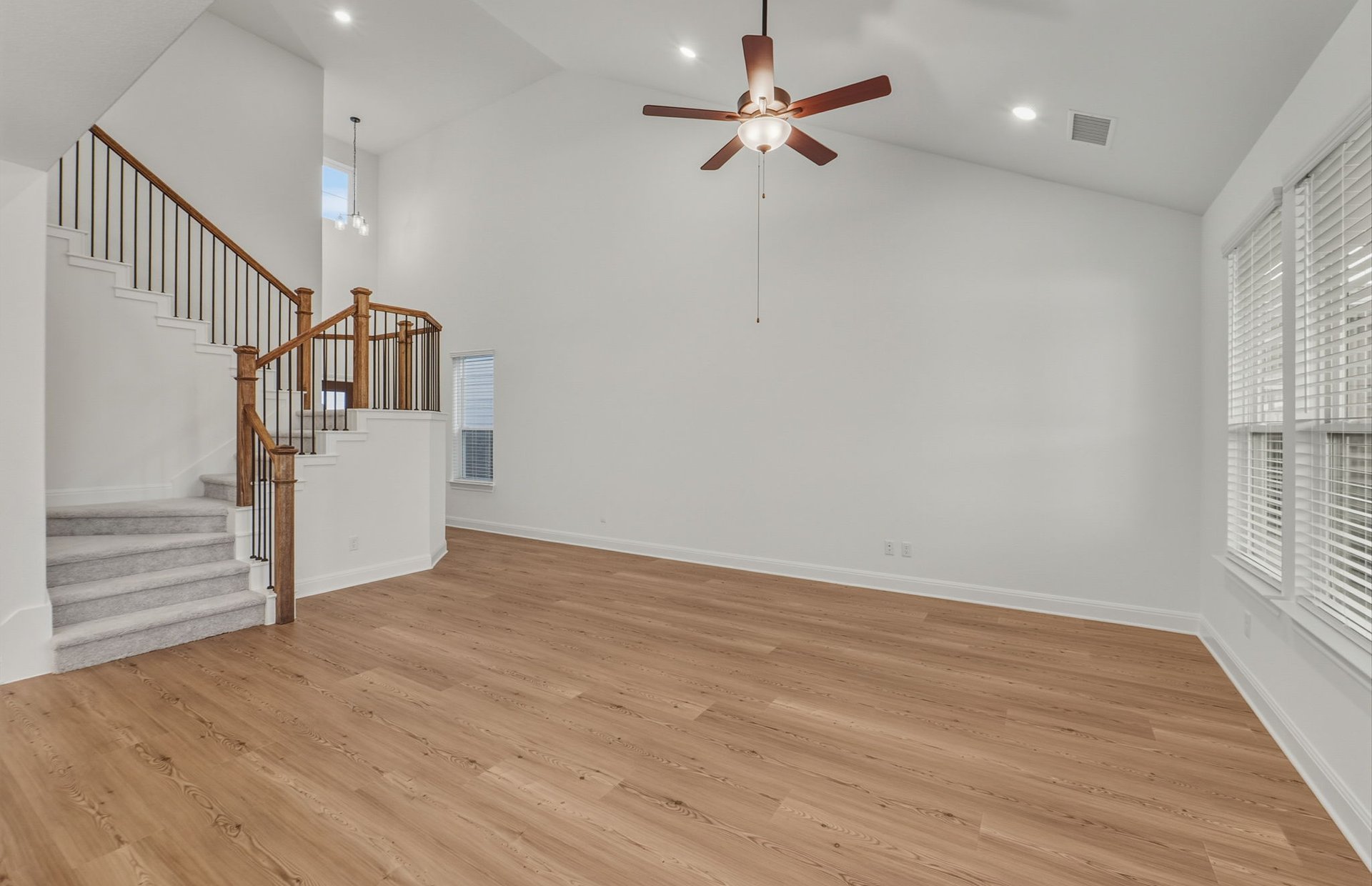 456 Foresail Road Leander, TX 78641 - Photo 3 of 22 wooden floor in an empty room with a window