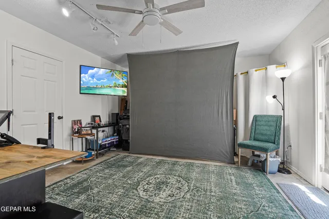 a view of a chairs and table in the patio