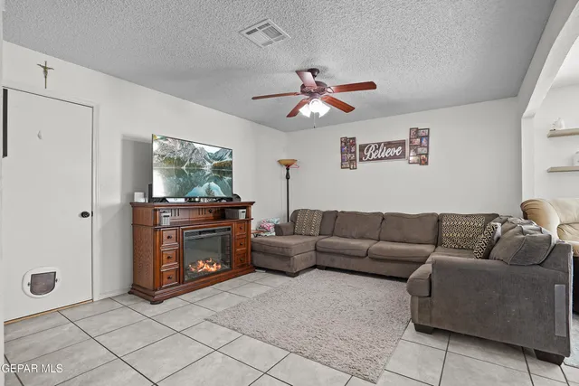 a living room with furniture and a window