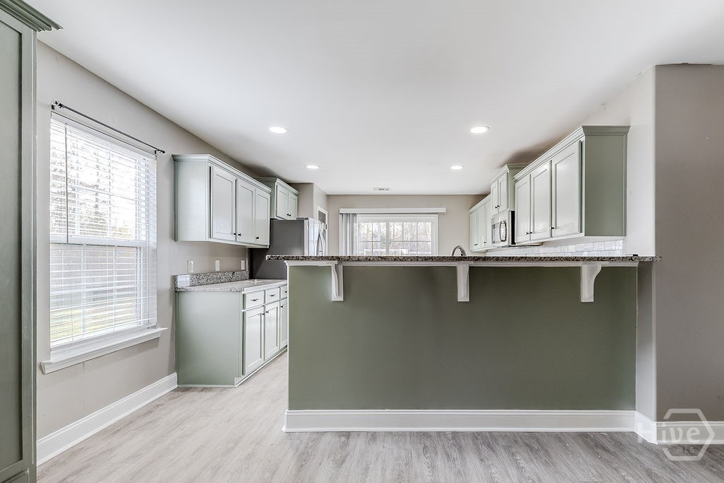 190 Cypress Cove Lane Rincon, GA 31326 - Photo 12 of 37 Kitchen breakfast bar