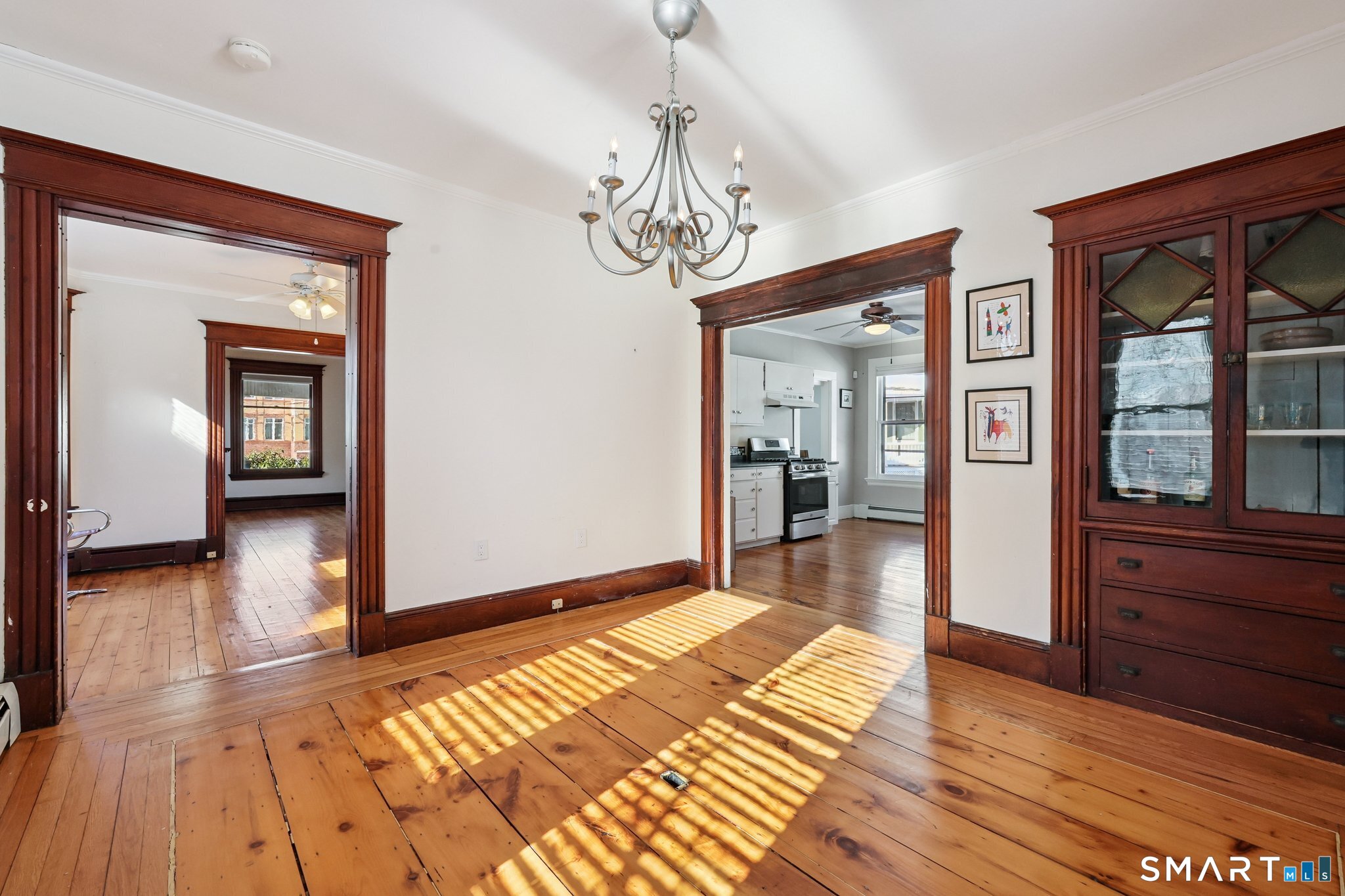 56 Whitney Street Hartford, CT 06105 - Photo 13 of 40 a view of livingroom with furniture and wooden floor