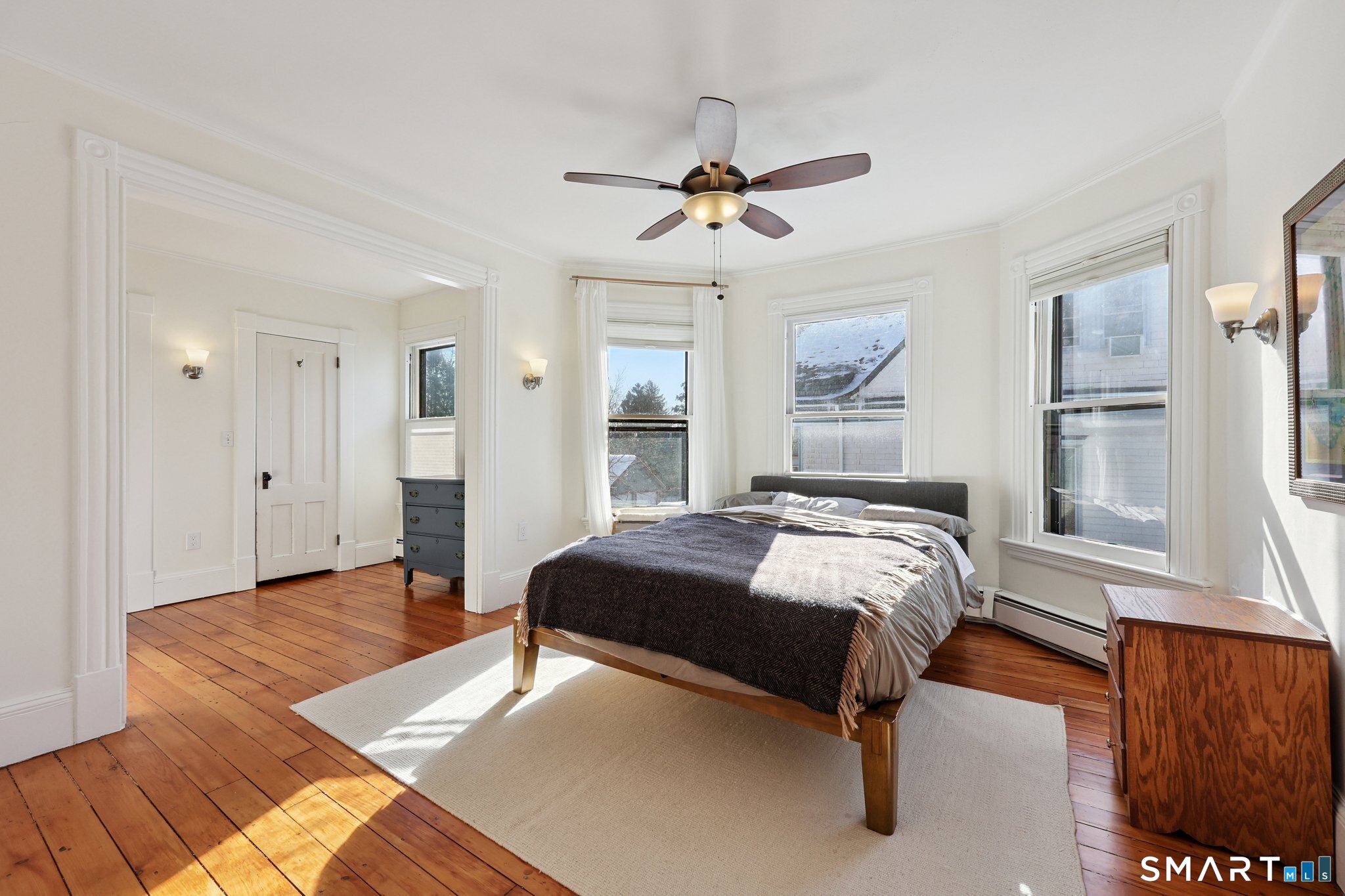 56 Whitney Street Hartford, CT 06105 - Photo 23 of 40 a bedroom with a bed and window