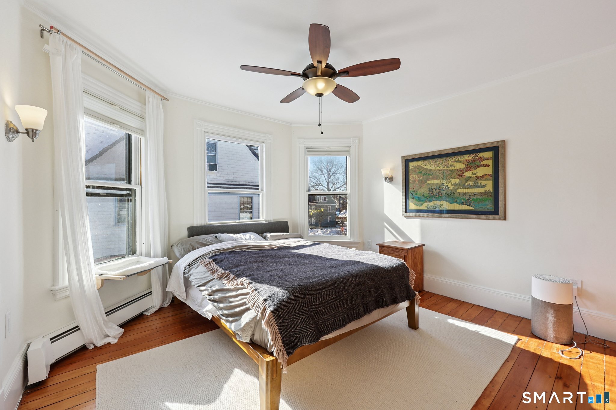 56 Whitney Street Hartford, CT 06105 - Photo 24 of 40 a bedroom with a bed and a window