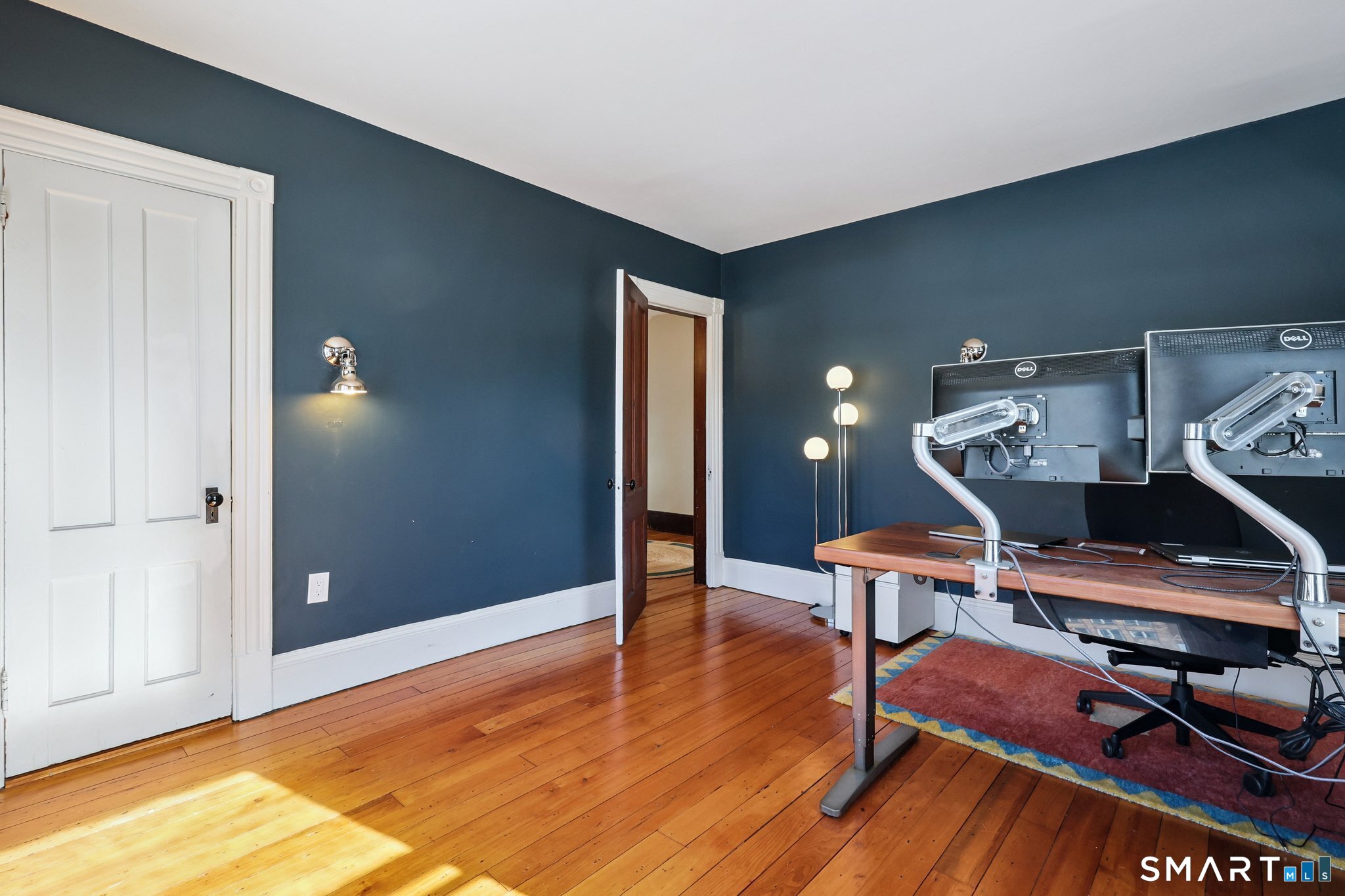56 Whitney Street Hartford, CT 06105 - Photo 29 of 40 a room with furniture and wooden floor