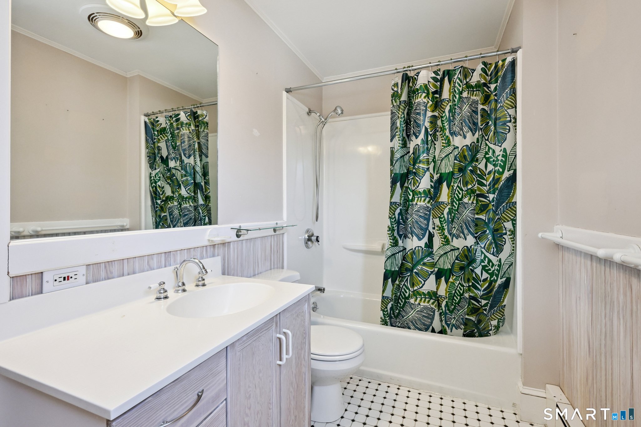 56 Whitney Street Hartford, CT 06105 - Photo 34 of 40 a bathroom with a sink a toilet and shower