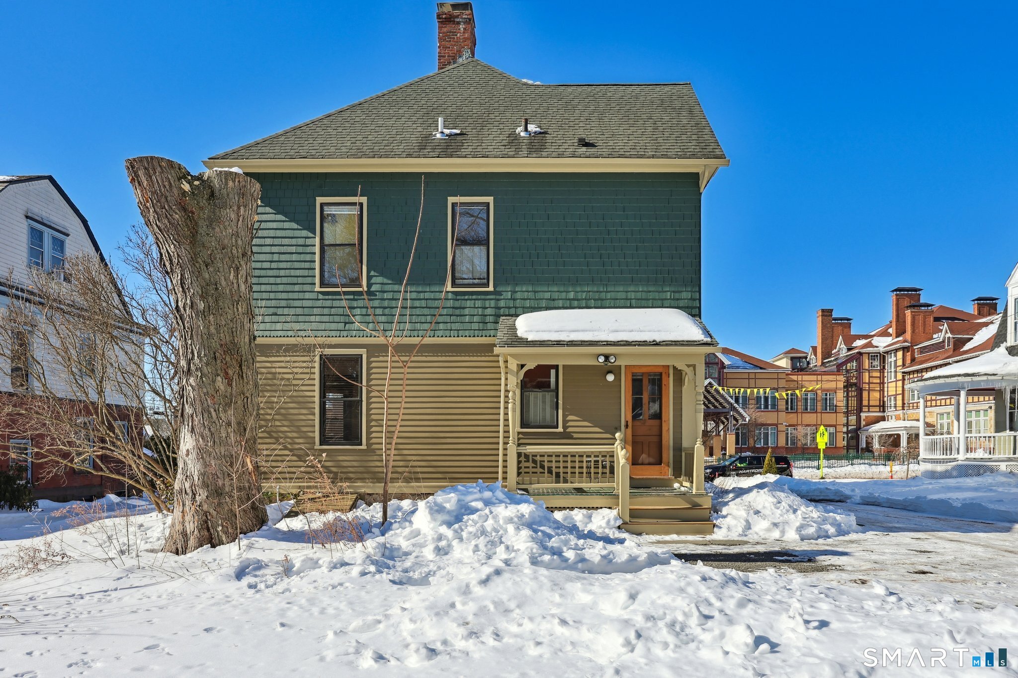 56 Whitney Street Hartford, CT 06105 - Photo 39 of 40 a view of a house with wooden fence