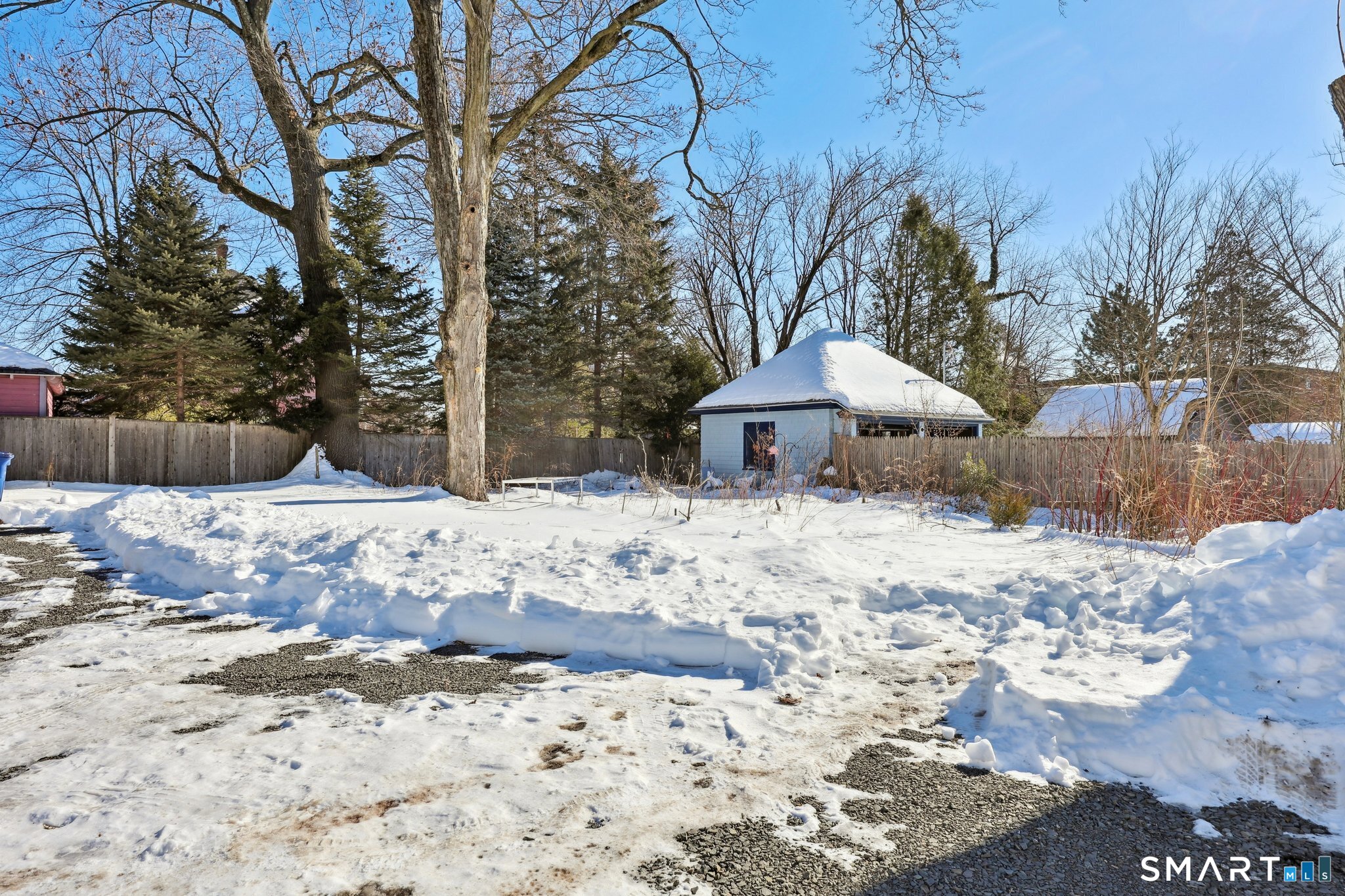 56 Whitney Street Hartford, CT 06105 - Photo 40 of 40 a front view of house with yard covered in snow