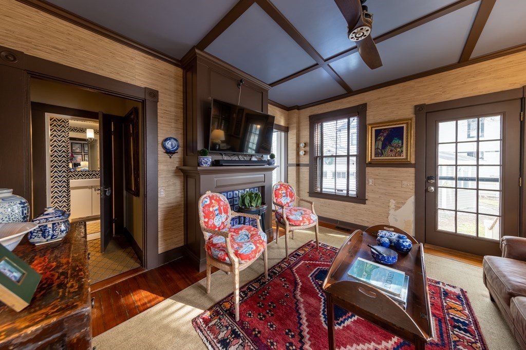 41 Union Street Fairhaven, MA 02719 - Photo 15 of 41 a living room with furniture a flat screen tv and a dining table