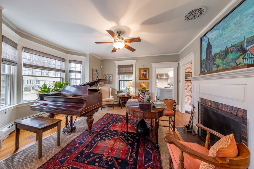 41 Union Street Fairhaven, MA 02719 - Photo 25 of 41 a living room with furniture a fireplace and a window