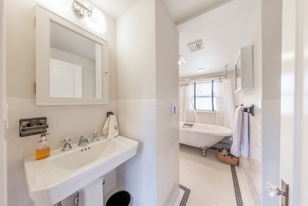 41 Union Street Fairhaven, MA 02719 - Photo 39 of 41 a bathroom with a sink toilet and tub