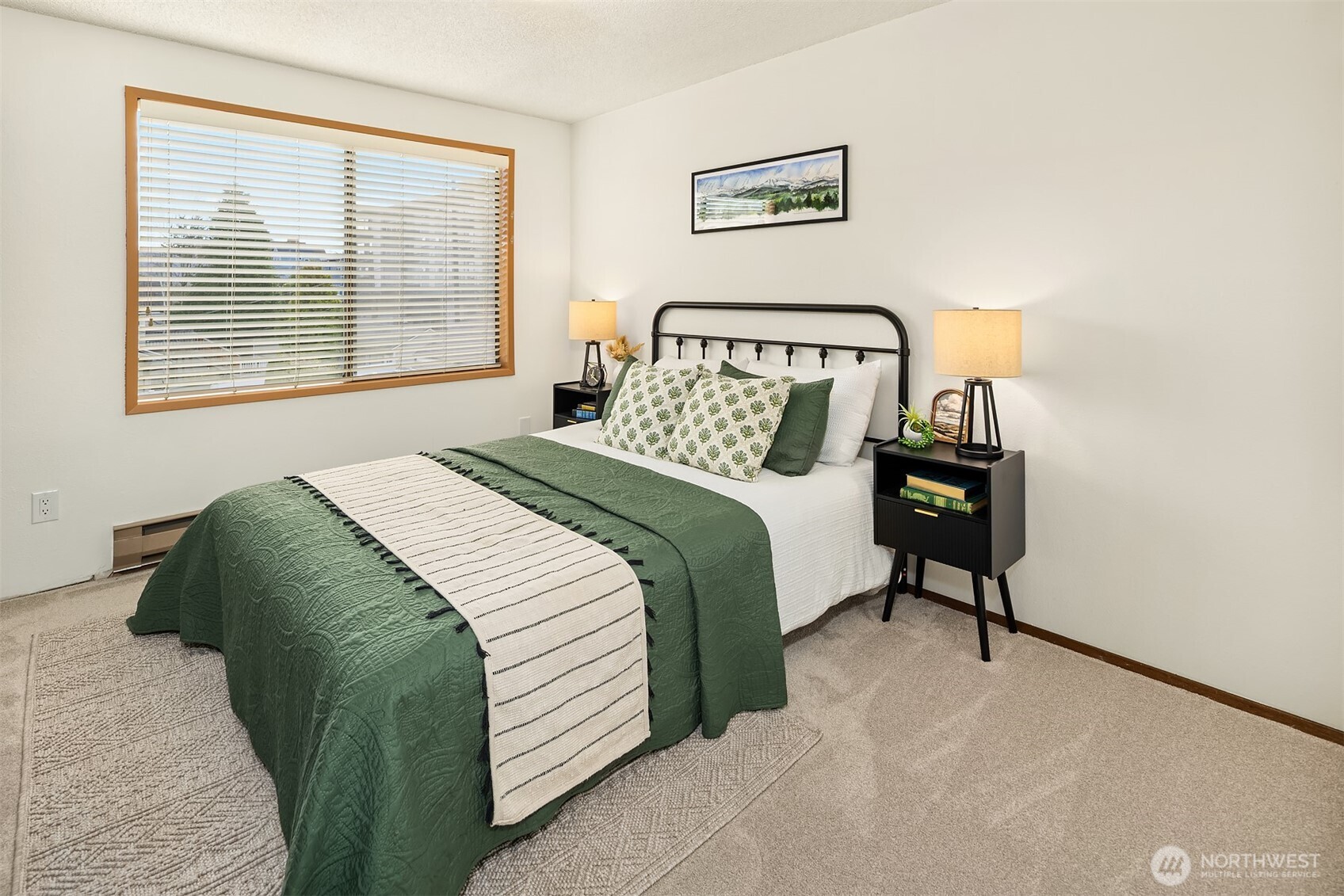 1612 33rd Street, Unit 104 Everett, WA 98201 - Photo 18 of 24 a bedroom with a bed and a window