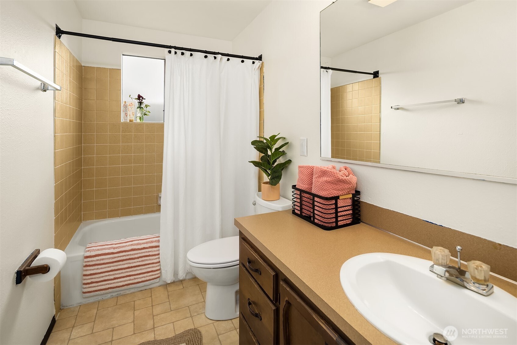 1612 33rd Street, Unit 104 Everett, WA 98201 - Photo 19 of 24 a bathroom with a sink toilet and shower