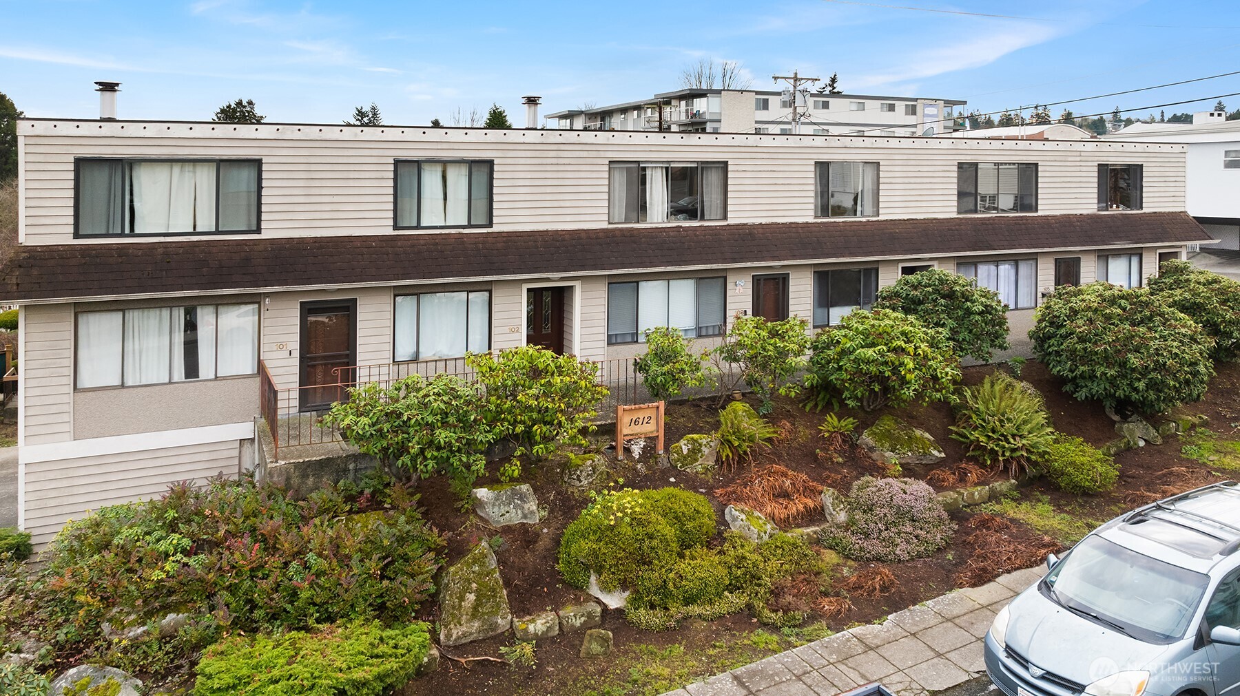 1612 33rd Street, Unit 104 Everett, WA 98201 - Photo 22 of 24 front view of a house with a yard