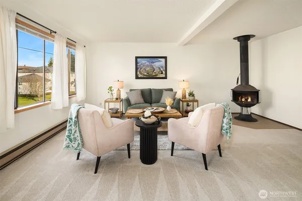 a living room with furniture and a window